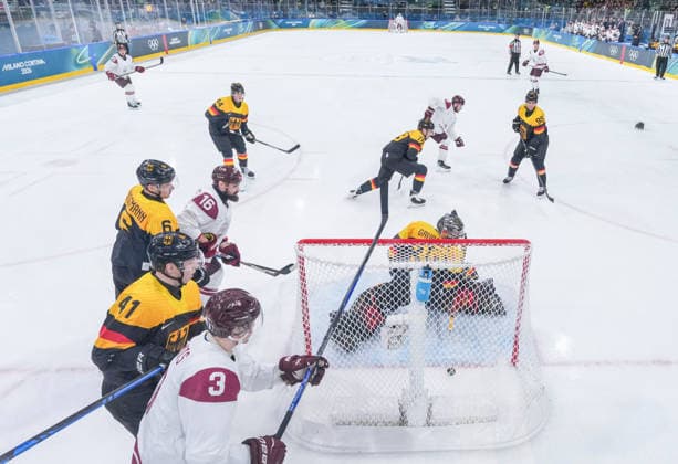 (260214) -- MILAN, Feb. 14, 2026 -- Philipp Grubauer (bottom C), goalkeeper of Germany fails to make a save during the Ice hockey, Eishockey men s preliminary round group C match between Germany and Latvia of the Milan-Cortina 2026 Olympic Winter games, Winterspiele,Spiele, Summer games in Milan, Italy, Feb. 14, 2026. ) (MICO2026)ITALY-MILAN-OLYMPIC WINTER GAMES-ICE HOCKEY-MEN-PRELIMINARY-GER VS LAT SunxFei 