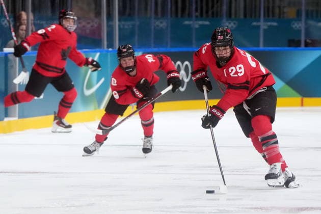 February 14, 2026, Milan, ITALY: Canada s Marie-Philip Poulin (29) moves the puck up the ice during the first period of a women s hockey quarterfinal game against Germany at the 2026 Winter Olympics, in Milan, Saturday, Feb. 14, 2026. Canada News - February 14, 2026  - ZUMAc35_ 20260214_zaf_c35_011 Copyright: xDarrylxDyckx