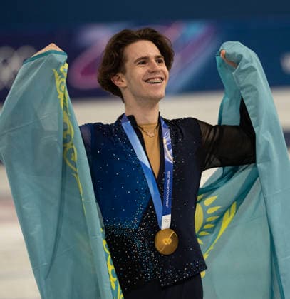 February 14, 2026, Milan, Lombardy, Italy: KazakhstanÃ¢â‚¬â ¢s MIKHAIL SHAIDOROV with country flag to with his Gold Medal after winning in menÃ¢â‚¬â ¢s Figure skating, Eiskunstlauf Friday at the Milano Ice Skating Arena during this Milano Cortina 2026 Olympics. Milan Italy - ZUMAa35_ 20260214_oly_a35_034 Copyright: xDanielxA.xAndersonx