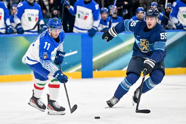 14 02 2026, Milano, Santa Giulia Ice hockey, Eishockey Arena, Winter Olympics: Finland - Italy (Ice Hockey), Diego Kostner of Italy against Rasmus Ristolainen of Finland Milano Santa Giulia Ice Hockey Arena Lombardy Italy *** 14 02 2026, Milano, Santa Giulia Ice Hockey Arena, Winter Olympics Finland Italy Ice Hockey , Diego Kostner of Italy against Rasmus Ristolainen of Finland Milano Santa Giulia Ice Hockey Arena Lombardy Italy Copyright: xJustPictures.ch AndreaxBrancax jp-en-AnBr-AB-AAB_878614022026