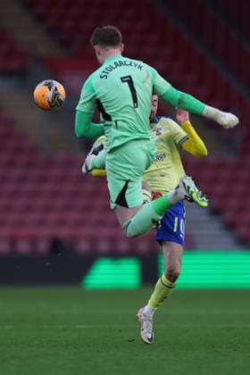 Football - 2025 2026 Emirates FA Cup - Round 4 - Southampton vs Leicester City - St Mary™s Stadium - Saturday 14th February 2026 Jakub Stolarczyk of Leicester City clears from Finn Azaz of Southampton the FA Cup match at St Mary™s Stadium COLORSPORT Shaun Boggust 