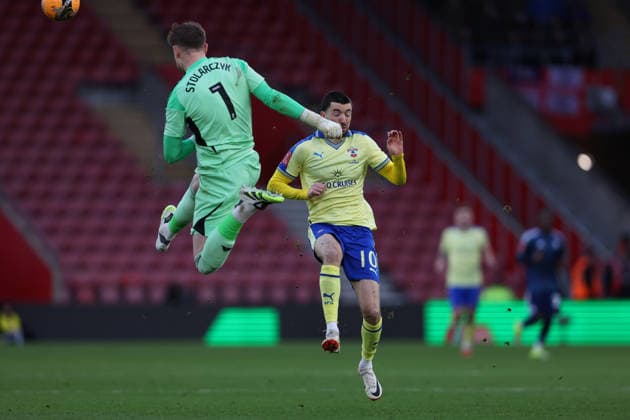 Football - 2025 2026 Emirates FA Cup - Round 4 - Southampton vs Leicester City - St Mary™s Stadium - Saturday 14th February 2026 Jakub Stolarczyk of Leicester City clears from Finn Azaz of Southampton the FA Cup match at St Mary™s Stadium COLORSPORT Shaun Boggust 