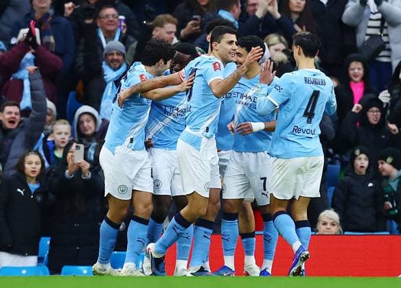 Marc Guehi of Manchester City celebrates scoring a goal to make it 2-0 with their team-mates Manchester City v Salford City, Emirates FA Cup, Fourth Round, Football, Etihad Stadium, Manchester, UK - 14 Feb 2026Manchester Etihad Stadium United Kingdom EDITORIAL USE ONLY No use with unauthorised audio, video, data, fixture lists, club league logos or live services. Online in-match use limited to 120 images, no video emulation. No use in betting, games or single club league player publications. Copyright: xMattxWest Shutterstockx 16608276ad