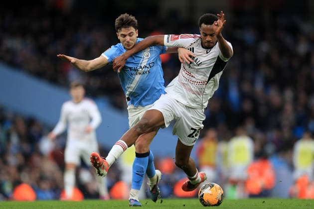 14th February 2026; Etihad Stadium, Manchester, Lancashire, England; FA Cup Football, Manchester City versus Salford City ; Nico Gonzales of Manchester City tackles Zach Awe of Salford City  DavidxBlunsden Content restricted for UK based newspaper