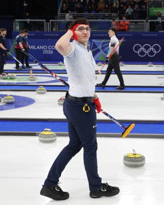 USA s Aidan Oldenburg celebrates victory over Germany in the Round Robin Team Curling match at the 2026 Winter Olympics in Cortina, Italy on Saturday February 14, 2026. USA won the match 8-6.  OLY20260214616 HUGOxPHILPOTT