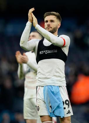Manchester, England, 14th February 2026. Luke Garbutt of Salford City claps the fans during the Manchester City vs Salford City FA Cup fourth round match at the Etihad Stadium, Manchester. Picture credit should read: Andrew Yates Sportimage EDITORIAL USE ONLY. No use with unauthorised audio, video, data, fixture lists, club league logos or live services. Online in-match use limited to 120 images, no video emulation. No use in betting, games or single club league player publications. SPI_058_AY_Man_City_Salford SPI-4533-0061