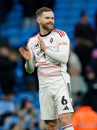 Manchester, England, 14th February 2026. Oliver Turton of Salford City claps the fans during the Manchester City vs Salford City FA Cup fourth round match at the Etihad Stadium, Manchester. Picture credit should read: Andrew Yates Sportimage EDITORIAL USE ONLY. No use with unauthorised audio, video, data, fixture lists, club league logos or live services. Online in-match use limited to 120 images, no video emulation. No use in betting, games or single club league player publications. SPI_059_AY_Man_City_Salford SPI-4533-0062