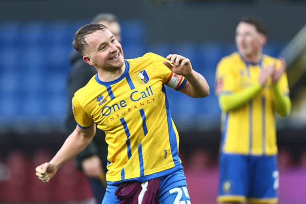 Louis Reed of Mansfield Town celebrates victory Burnley v Mansfield Town, Emirates FA Cup, Fourth Round, Football, Turf Moor, Burnley, UK - 14 Feb 2026Burnley Turf Moor United Kingdom EDITORIAL USE ONLY No use with unauthorised audio, video, data, fixture lists, club league logos or live services. Online in-match use limited to 120 images, no video emulation. No use in betting, games or single club league player publications. Copyright: xPhilxOldham Shutterstockx 16608267bn