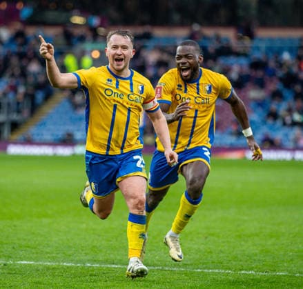 Burnley v Mansfield Town Emirates FA Cup Louis Reed of Mansfield Town celebrates after scoring his sides second goal during the Emirates FA Cup Fourth Round match at Turf Moor, Burnley 14 02 2026 UK Newspapers OUT Copyright: xJamesxHarrisonx FIL-22978-0027