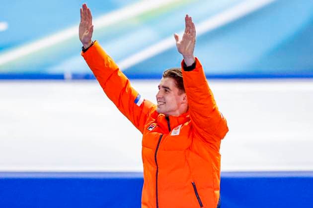 Jenning de Boo of the Netherlands celebrates during the medal ceremony after Men s 500m, Milano Cortina 2026 Winter Olympics: Day 8, Speed skating, Eisschnelllauf - Milano Cortina 2026 Winter Olympics: Day 8, Milano Speed Skating Stadium, February 14, 2026, Milan, Italy.