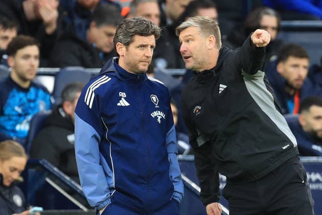 14th February 2026; Etihad Stadium, Manchester, Lancashire, England; FA Cup Football, Manchester City versus Salford City ; Salford City manager Karl Robinson consults his assistant Alex Bruce  DavidxBlunsden Content restricted for UK based newspaper