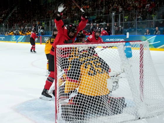 February 14, 2026, Milan, ITALY: Canada s Natalie Spooner (24) celebrates a goal by teammate Sarah Fillier (10) in front of Germany goalie Sandra Abstreiter (35) during the second period of a women s hockey quarterfinal game at the 2026 Winter Olympics, in Milan, Saturday, Feb. 14, 2026. Canada News - February 14, 2026  - ZUMAc35_ 20260214_zaf_c35_057 Copyright: xDarrylxDyckx