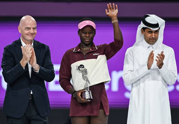 Qatar TotalEnergies Open 2026 - Singles Final DOHA, QATAR FEBRUARY 14: Victoria Mboko of Canada holds the runner-up trophy after losing to Karolina Muchova of the Czech Republic in the singles final on Day Seven of the Qatar TotalEnergies Open, part of the Hologic WTA, Tennis Damen Tour, at the Khalifa International Tennis and Squash Complex on February 14, 2026 in Doha, Qatar. Doha Qatar  Copyright: xArturxWidakx originalFilename:widak-qatartot260214_npmaP.jpg