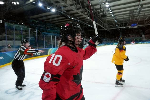 February 14, 2026, Milan, ITALY: Canada s Sarah Fillier (10) celebrates her goal during the second period of a women s hockey quarterfinal game against Germany at the 2026 Winter Olympics, in Milan, Saturday, Feb. 14, 2026. Canada News - February 14, 2026  - ZUMAc35_ 20260214_zaf_c35_058 Copyright: xDarrylxDyckx