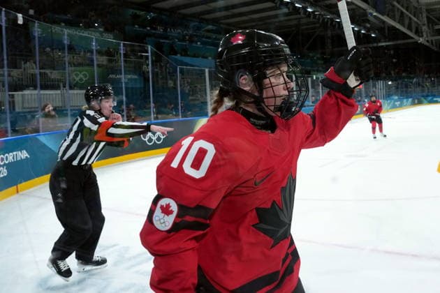 February 14, 2026, Milan, ITALY: Canada s Sarah Fillier (10) celebrates her goal during the second period of a women s hockey quarterfinal game against Germany at the 2026 Winter Olympics, in Milan, Saturday, Feb. 14, 2026. Canada News - February 14, 2026  - ZUMAc35_ 20260214_zaf_c35_059 Copyright: xDarrylxDyckx