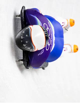 February 14, 2026, Cortina D ampezzo, Lombardy, Italy: Kelly Curtis of the USA competes in the third run of the WomenÃ¢â‚¬â ¢s Skeleton at the Cortina Sliding Centre for the Milano Cortina 2026 Winter Olympics. Cortina D ampezzo Italy - ZUMAsc5_ 20260214_oly_sc5_004 Copyright: xErichxSchlegelx