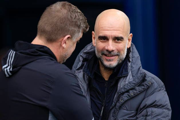 Manchester City v Salford City, FA Cup Pep Guardiola the Manchester City manager greets Karl Robinson the Salford City manager ahead of the FA Cup match between Manchester City and Salford City at the Etihad Stadium, Manchester, UK on 14 February 2026. Manchester Etihad Stadium Manchester UK Editorial use only DataCo restrictions apply See www.football-dataco.com , Copyright: xConorxMolloyx PSI-23752-0090