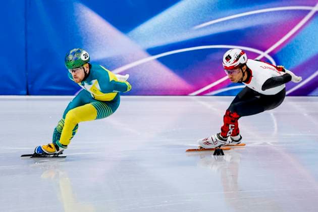 Brendan Corey of Australia and William Dandjinou of Canada Men s 1500m Quarterfinals, Milano Cortina 2026 Winter Olympics: Day 8, Short Track Speed skating, Eisschnelllauf - Milano Cortina 2026 Winter Olympics: Day 8, Milano Speed Skating Stadium, February 14, 2026, Milan, Italy.