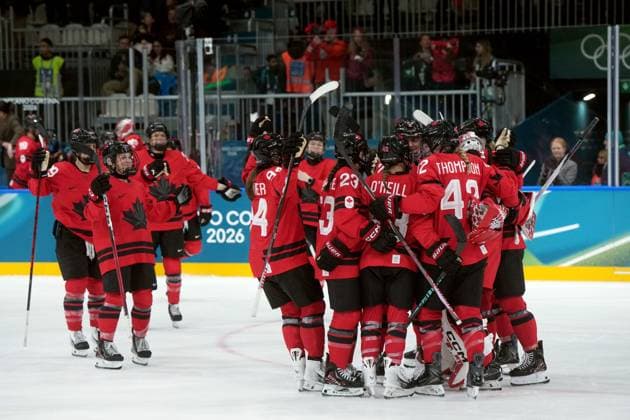 February 14, 2026, Milan, ITALY: Canada players celebrate the team s 5-1 win over Germany following the third period of a women s hockey quarterfinal game at the 2026 Winter Olympics, in Milan, Saturday, Feb. 14, 2026. Canada News - February 14, 2026  - ZUMAc35_ 20260214_zaf_c35_086 Copyright: xDarrylxDyckx