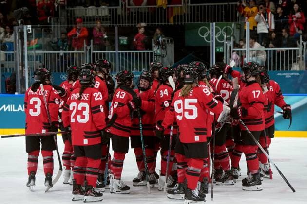 February 14, 2026, Milan, ITALY: Canada players celebrate the team s 5-1 win over Germany following the third period of a women s hockey quarterfinal game at the 2026 Winter Olympics, in Milan, Saturday, Feb. 14, 2026. Canada News - February 14, 2026  - ZUMAc35_ 20260214_zaf_c35_087 Copyright: xDarrylxDyckx