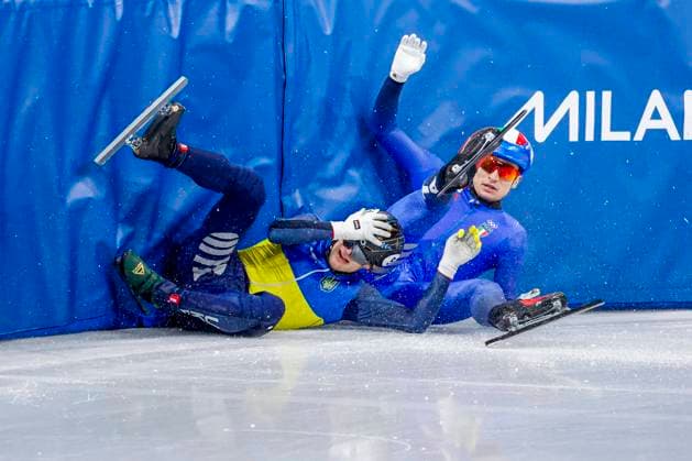 crash Oleh Handei of Ukraine and Pietro Sighel of Italy Men s 1500m Quarterfinals, Milano Cortina 2026 Winter Olympics: Day 8, Short Track Speed skating, Eisschnelllauf - Milano Cortina 2026 Winter Olympics: Day 8, Milano Speed Skating Stadium, February 14, 2026, Milan, Italy.