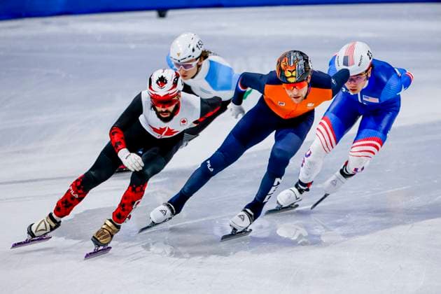 Steven Dubois of Canada and Friso Emons of the Netherlands and Brandon Kim of United States of America Men s 1500m Quarterfinals, Milano Cortina 2026 Winter Olympics: Day 8, Short Track Speed skating, Eisschnelllauf - Milano Cortina 2026 Winter Olympics: Day 8, Milano Speed Skating Stadium, February 14, 2026, Milan, Italy.