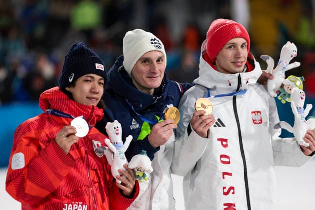 OLYMPICS - Winter Olympic Games, Olympische Spiele, Olympia, OS Milano Cortina 2026 PREDAZZO,ITALY,14.FEB.26 - OLYMPICS, Ski jumping, Skispringen, Ski, nordisch - Winter Olympic Games Milano Cortina 2026, large hill, men, medal ceremony. Image shows Ren Nikaido (JPN), Domen Prevc (SLO) and Kacper Tomasiak (POL).  GEPAxpictures xMatthiasxTrinkl