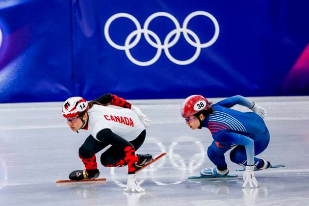 Courtney Sarault of Canada and Cloe Ollivier of France Women s 1000m, Milano Cortina 2026 Winter Olympics: Day 8, Short Track Speed skating, Eisschnelllauf - Milano Cortina 2026 Winter Olympics: Day 8, Milano Speed Skating Stadium, February 14, 2026, Milan, Italy.