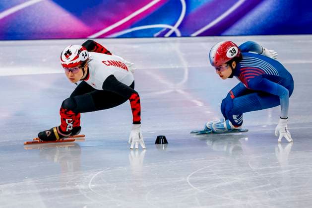 Courtney Sarault of Canada and Cloe Ollivier of France Women s 1000m, Milano Cortina 2026 Winter Olympics: Day 8, Short Track Speed skating, Eisschnelllauf - Milano Cortina 2026 Winter Olympics: Day 8, Milano Speed Skating Stadium, February 14, 2026, Milan, Italy.