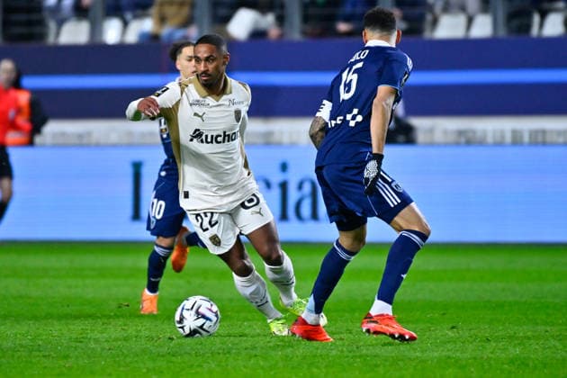 FOOTBALL : Paris FC vs Lens - Ligue 1 - 14 02 2026 Wesley Said ( 22 - Lens ) and Timothee Kolodziejczak ( 15 - PFC ) during the Ligue 1 match between Paris FC and RC Lens at Stade Jean Bouin on February 14, 2026 in Paris, France. ( Photo by Federico Pestellini PsnewZ ) - ParisFrance  Copyright: xFedericoxPestellinix