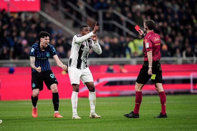 Juventus Pierre Kalulu walks off the pitch after getting a red card during the Serie A soccer match between Inter and Juventus at the San Siro Stadium in Milan , north Italy - Saturday, February 14, 2025. - Soccer .  Copyright: xMarcoxAlpozzi LaPressex
