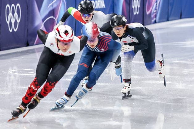 ITALY, MILAN - FEBRUARY 14, 2026: Courtney Sarault of Canada, Cloe Ollivier of France, Ami Hirai of Japan (L-R front) and Diana Laura Vegi of Hungary compete in the women s 1,000m short-track Speed skating, Eisschnelllauf heats during the 2026 Winter Olympic Games, Olympische Spiele, Olympia, OS at the Milano Ice Skating Arena. Peter Kovalev TASS  88712240
