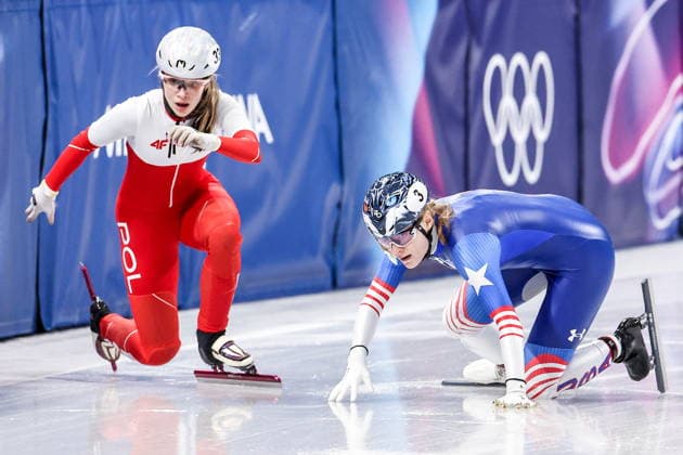 ITALY, MILAN - FEBRUARY 14, 2026: Gabriela Topolska (L) of Poland and Corinne Stoddard of the US compete in the women s 1,000m short-track Speed skating, Eisschnelllauf heats during the 2026 Winter Olympic Games, Olympische Spiele, Olympia, OS at the Milano Ice Skating Arena. Peter Kovalev TASS  88712867