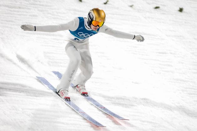 OLYMPICS - Winter Olympic Games, Olympische Spiele, Olympia, OS Milano Cortina 2026 PREDAZZO,ITALY,14.FEB.26 - OLYMPICS, Ski jumping, Skispringen, Ski, nordisch - Winter Olympic Games Milano Cortina 2026, large hill, men. Image shows Sandro Hauswirth (SUI).  GEPAxpictures xMatthiasxTrinkl