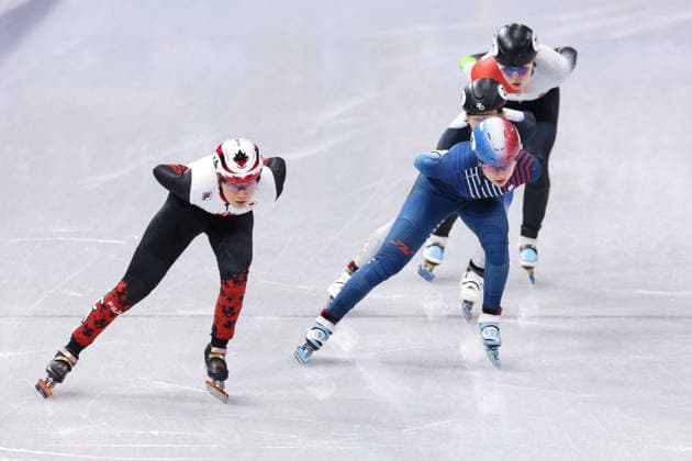 Winter Olympics - Cloe Ollivier At Short Track Speed skating, Eisschnelllauf Women 1000M SARAULT Courtney of Team Canada and Cloe Ollivier of Team France compete in heat 1 of the Short Track Speed Skating Women s 1000m on day eight of the Milano Cortina 2026 Winter Olympic Games, Olympische Spiele, Olympia, OS at Milano Ice Skating Arena on February 14, 2026 in Milan, Italy. Photo by Alexis Jumeau ABACAPRESS.COM Milan Italy  Copyright: xJumeauxAlexis ABACAx