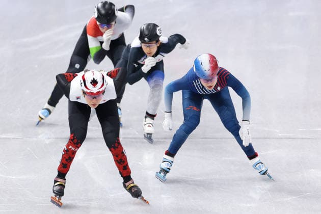 Winter Olympics - Cloe Ollivier At Short Track Speed skating, Eisschnelllauf Women 1000M SARAULT Courtney of Team Canada, Cloe Ollivier of Team France compete in heat 1 of the Short Track Speed Skating Women s 1000m on day eight of the Milano Cortina 2026 Winter Olympic Games, Olympische Spiele, Olympia, OS at Milano Ice Skating Arena on February 14, 2026 in Milan, Italy. Photo by Alexis Jumeau ABACAPRESS.COM Milan Italy  Copyright: xJumeauxAlexis ABACAx