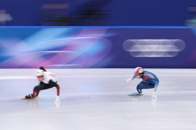 Winter Olympics - Cloe Ollivier At Short Track Speed skating, Eisschnelllauf Women 1000M SARAULT Courtney of Team Canada and Cloe Ollivier of Team France compete in heat 1 of the Short Track Speed Skating Women s 1000m on day eight of the Milano Cortina 2026 Winter Olympic Games, Olympische Spiele, Olympia, OS at Milano Ice Skating Arena on February 14, 2026 in Milan, Italy. Photo by Alexis Jumeau ABACAPRESS.COM Milan Italy  Copyright: xJumeauxAlexis ABACAx