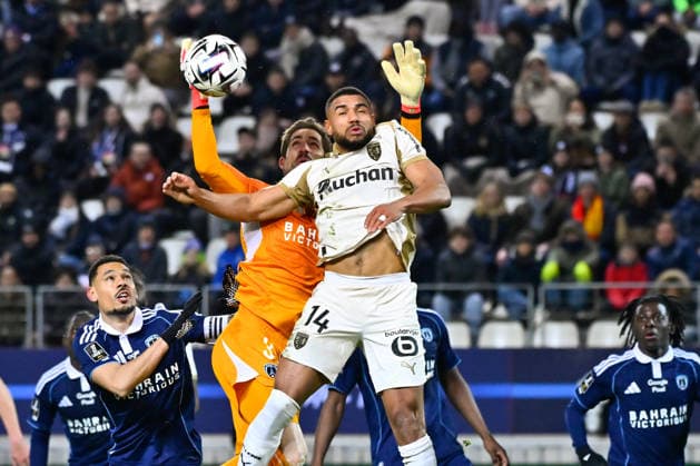 FOOTBALL : Paris FC vs Lens - Ligue 1 - 14 02 2026 Matthieu Udol ( 14 - Lens ) and Kevin Trapp ( 35 - PFC ) during the Ligue 1 match between Paris FC and RC Lens at Stade Jean Bouin on February 14, 2026 in Paris, France. ( Photo by Federico Pestellini PsnewZ ) - ParisFrance  Copyright: xFedericoxPestellinix