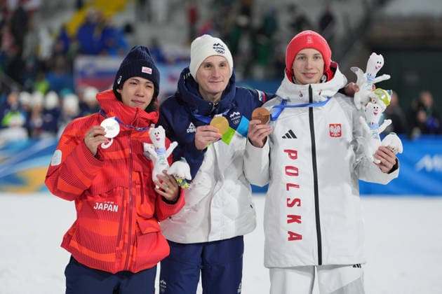 Milano Cortina 2026 Olympic Winter games, Winterspiele,Spiele, Summer games MILAN, ITALY - FEBRUARY 14: Slovenian athlete Domen Prevc (C) wins gold medal, Japanese athlete Ren Nikaido (L) wins silver medal and Polish athlete Kacper Tomasiak (R) wins bronze medal in the men’s large hill Ski jumping, Skispringen, Ski, nordisch event during the Milano-Cortina 2026 Winter Olympic Games, Olympische Spiele, Olympia, OS in Milan, Italy, on February 14, 2026. Cemal Yurttas Anadolu Milan Italy. Editorial use only. Please get in touch for any other usage.  Copyright: x2026xAnadoluxCemalxYurttasx