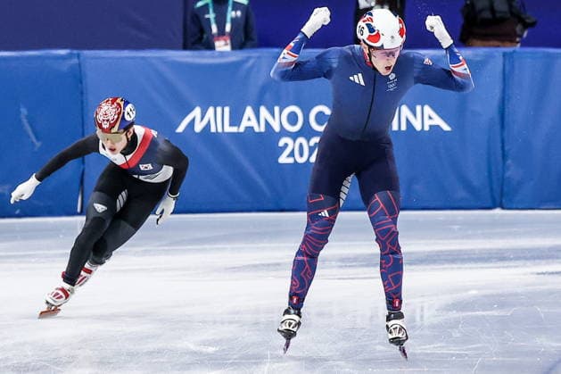 ITALY, MILAN - FEBRUARY 14, 2026: Niall Treacy (front) of the United Kingdom and Shin Dong-min of South Korea compete in the men s 1,500m short-track Speed skating, Eisschnelllauf semifinals during the 2026 Winter Olympic Games, Olympische Spiele, Olympia, OS at the Milano Ice Skating Arena 2026 Winter Olympics: Short-Track Speed Skating  - ZUMAt113 20260214_zaa_t113_407 Copyright: xPeterxKovalevx