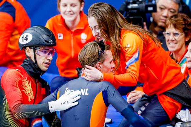 Michelle Velzeboer of the Netherlands and winner Jens van t Wout of the Netherlands celebrates and Shaoang Liu of China congratulate after Men s 1500m Finals, Milano Cortina 2026 Winter Olympics: Day 8, Short Track Speed skating, Eisschnelllauf - Milano Cortina 2026 Winter Olympics: Day 8, Milano Speed Skating Stadium, February 14, 2026, Milan, Italy.