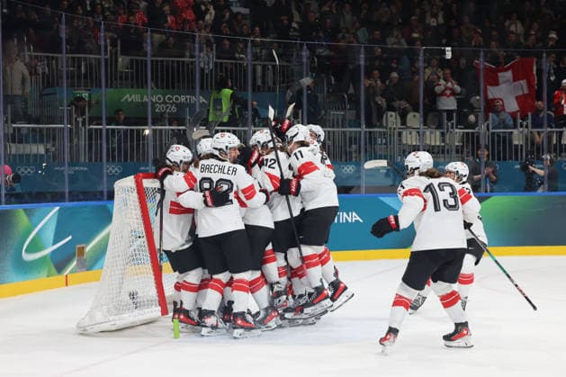 February 14, 2026, Milan, Lombardy, Italy: Team Switzerland celebrates their win over Team Finland in a women s Ice hockey, Eishockey quarterfinal during the Milano Cortina 2026 Olympic Winter games, Winterspiele,Spiele, Summer games at Milano Rho Ice Hockey Arena. Milan Italy - ZUMAm117 20260214_oly_m117_023 Copyright: xDavidxMcIntyrex