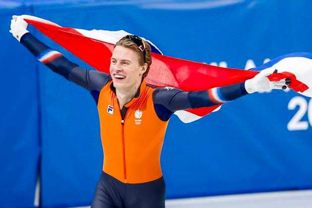 winner Jens van t Wout of the Netherlands celebrating and holding flag after Men s 1500m Finals, Milano Cortina 2026 Winter Olympics: Day 8, Short Track Speed skating, Eisschnelllauf - Milano Cortina 2026 Winter Olympics: Day 8, Milano Speed Skating Stadium, February 14, 2026, Milan, Italy.