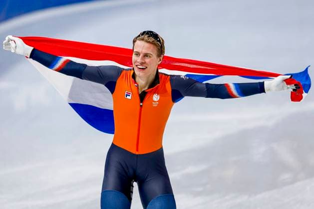 winner Jens van t Wout of the Netherlands celebrating and holding flag after Men s 1500m Finals, Milano Cortina 2026 Winter Olympics: Day 8, Short Track Speed skating, Eisschnelllauf - Milano Cortina 2026 Winter Olympics: Day 8, Milano Speed Skating Stadium, February 14, 2026, Milan, Italy.