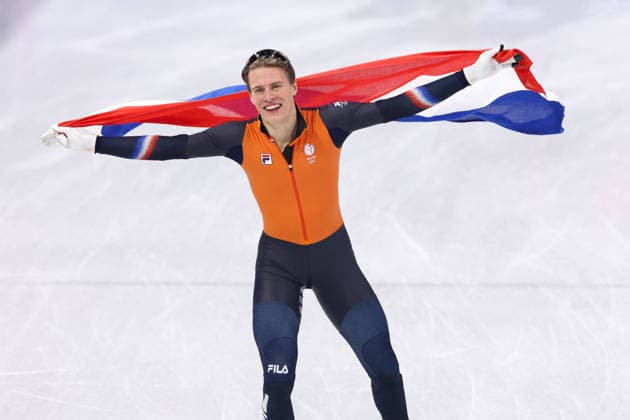 Winter Olympics - Jens van T Wout Wins Gold At Short Track Speed skating, Eisschnelllauf Men 1500M Jens van t Wout of Team Netherlands celebrates with his country s flag after winning gold in the short track speed skating men s 1500m final during the Milano Cortina 2026 Winter Olympic Games, Olympische Spiele, Olympia, OS at Milano Ice Skating Arena in Milan, Italy on February 14, 2026. Photo by Alexis Jumeau ABACAPRESS.COM Milan Italy  Copyright: xJumeauxAlexis ABACAx