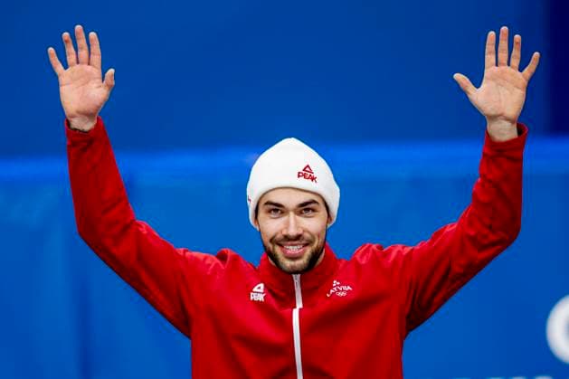 third Roberts Kruzbergs of Latvia celebrating during the medal ceremony after Men s 1500m Finals, Milano Cortina 2026 Winter Olympics: Day 8, Short Track Speed skating, Eisschnelllauf - Milano Cortina 2026 Winter Olympics: Day 8, Milano Speed Skating Stadium, February 14, 2026, Milan, Italy.