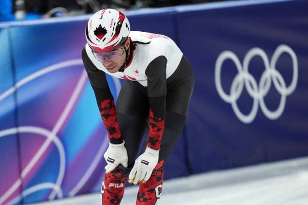 February 14, 2026, Milan, ITALY: Canada s William Dandjinou reacts after not placing in the Men s 1500m Short Track Speed skating, Eisschnelllauf final during the 2026 Milan Cortina Winter Olympics in Milan, Italy on Saturday, February 14, 2026. Canada News - February 14, 2026  - ZUMAc35_ 20260214_zaf_c35_202 Copyright: xNathanxDenettex