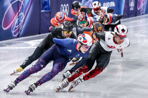 ITALY, MILAN - FEBRUARY 14, 2026: Niall Treacy of the UK, William Dandjinou (L-R front) of Canada, Roberts Kruzbergs of Latvia and Jens van t Wout (L-R middle) of the Netherlands compete in Final A of the men s 1,500m short-track Speed skating, Eisschnelllauf event during the 2026 Winter Olympic Games, Olympische Spiele, Olympia, OS at the Milano Ice Skating Arena 2026 Winter Olympics: Short-Track Speed Skating  - ZUMAt113 20260214_zaa_t113_428 Copyright: xPeterxKovalevx