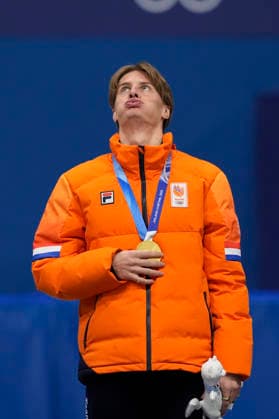Jens Van t Wout, of Netherlands, reacts after being rewarded his Gold Medal during the Ceremony for the Men s Short Track Speed skating, Eisschnelllauf 1500m Finals at the Milano Figure skating, Eiskunstlauf Arena in Milan, Italy on Saturday, February 14, 2026. Jens Van t Wout, of Netherlands won the Gold Medal, Daeheon Hwang, of South Korea the Silver Medal and Roberts Kruzbergs, of Latvia the Bronze Medal.  OLY20260214135 RichardxEllis