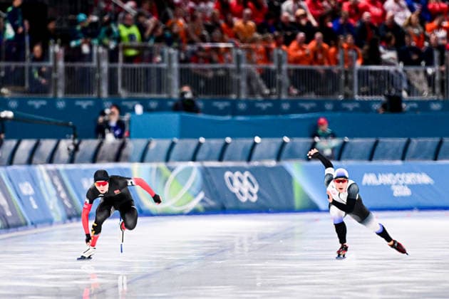 Katsuhiro KURATSUBO (JPN) vs Zhiwen XUE (CHN), during Speed skating, Eisschnelllauf Men s 500m, Speed Skating, at the Olympic Winter games, Winterspiele,Spiele, Summer games Milano Cortina 2026, at Milano Speed Skating Stadium, on February 14, 2026 in Milan, Italy. Noxthirdxpartyxsales  aflo_319873532